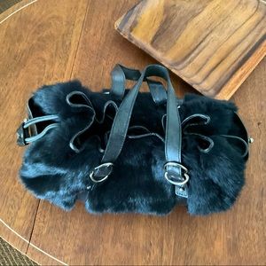 Black fur and leather purse